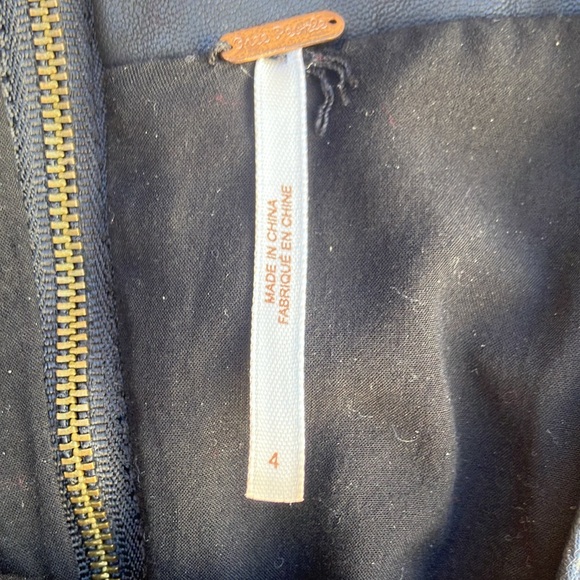 Free People faux leather mini skirt.  Fully lined.  Zips in the back.  Cute on! - Picture 4 of 9